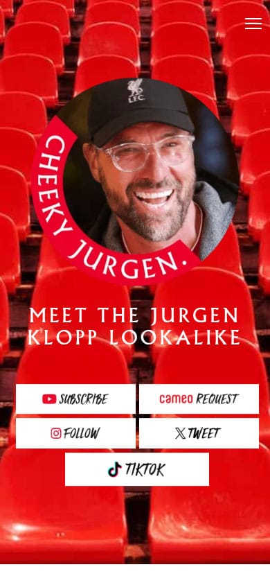 Cheeky Jurgen Klopp lookalike smiling in stadium seats